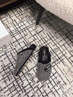FLAT MULE IN  BLACK SUEDE WITH CRYSTALS