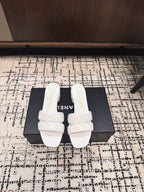 MID HEEL MULES IN WHITE SHEEPSKIN