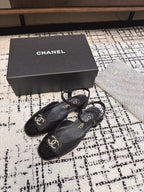 FLAT SLINGBACKS IN BLACK CALFSKIN