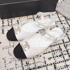 FLAT SLINGBACKS IN WHITE CALFSKIN AND BLACK FABRIC