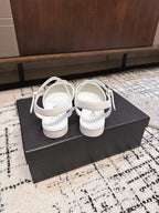 FLAT SLINGBACKS IN WHITE CALFSKIN AND BLACK FABRIC