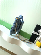 CHANEL 25S MAXI BOW BAG 26 IN BLUE DENIM WITH GOLD HARDWARE