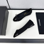 BALLET FLATS IN BLACK TWEED AND CALFSKIN