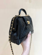 MEDIUM TOP HANDLE BAG 23 IN BLACK OIL-WAX LAMBSKIN GOLD HARDWARE