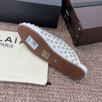 ALAIA FLAT MULES 25S IN WHITE LAMBSKIN EMBELLISHED WITH CRYSTALS