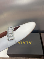 ALAIA MARY JANE FLATS 25S IN WHITE CALFSKIN WITH SILVER HARDWARE