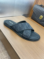 DIOR 25S ALIAS CROSS-STRAP SLIDES IN BLACK CALFSKIN WITH CD OBLIQUE DARK BLUE LOGO