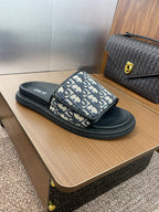 DIOR 25S ALIAS SLIDES IN BLACK CALFSKIN WITH CD OBLIQUE DEEP BLUE LOGO