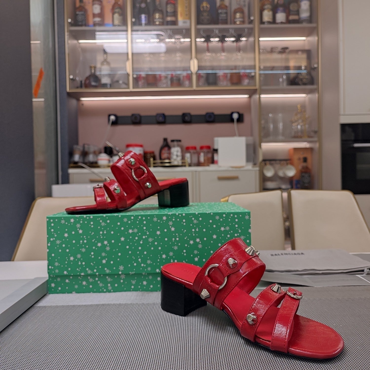 STRAPPY MEDIUM HEELED SANDALS IN RED STUDDED WAX-OIL SHEEPSKIN
