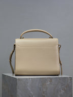 CASSANDRA TOP HANDLE BAG 24 IN BEIGE CALFSKIN GOLD HARDWARE