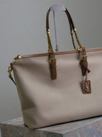 TRAVEL BAG 48 IN WHITE CANVAS AND BROWN LEATHER TRIM GOLD HARDWARE