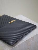 CLUTCH 36 IN BLACK QUILTED CALFSKIN GOLD BUCKLE