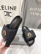 SLIDE SANDALS IN BLACK NYLON AND RUBBER YELLOW PRINT