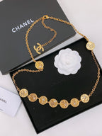 TWISTED CHAIN BELT WITH RHINESTONES AND LOGO PLATE IN GOLD TONE