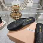 MULES SLIPPERS BLACK COWHIDE
