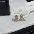 LETTERS CRYSTALS EARRINGS IN METAL GOLD WITH PEARLS