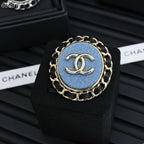 25P BROOCH IN BLUE DENIM BLACK LEATHER-THREADED OVAL