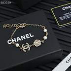 CC BRACELET 25P IN GOLD METAL PEARLY WHITE AND CRYSTAL