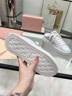 SNEAKER MULES IN WHITE BLEACHED CALFSKIN
