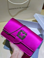 Manolo Capri embellished satin clutch in purple